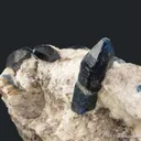 Afghanite (TL) (fl) on Calcite (fl) - image 3