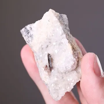 Allanite-(Ce) on Dolomite