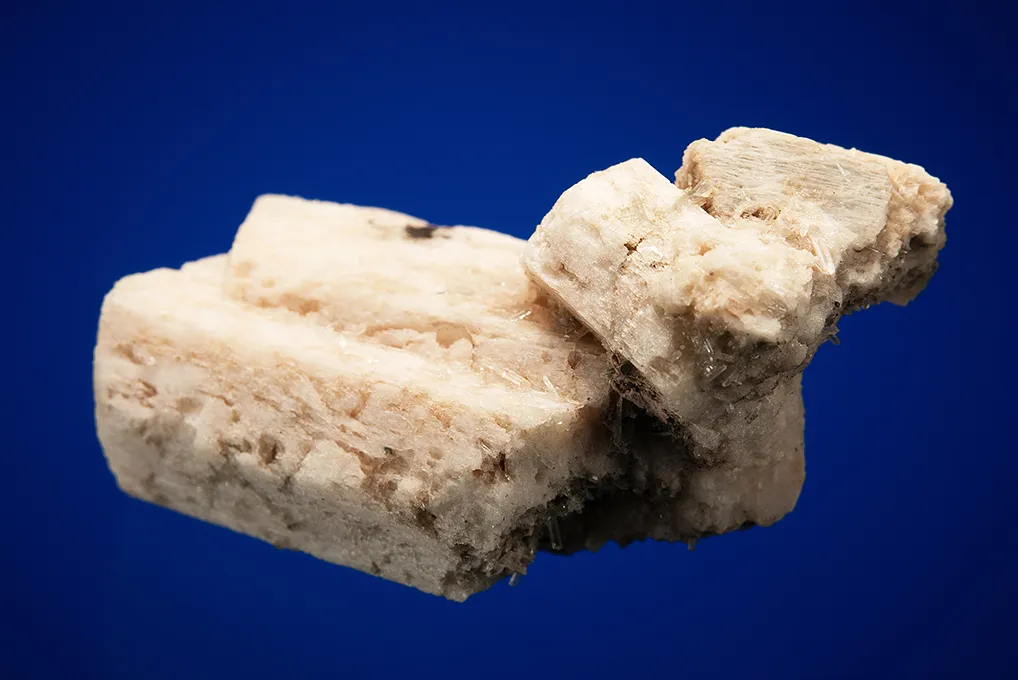 Allanite-(Ce) on Microcline (Carlsbad twin) - image 3