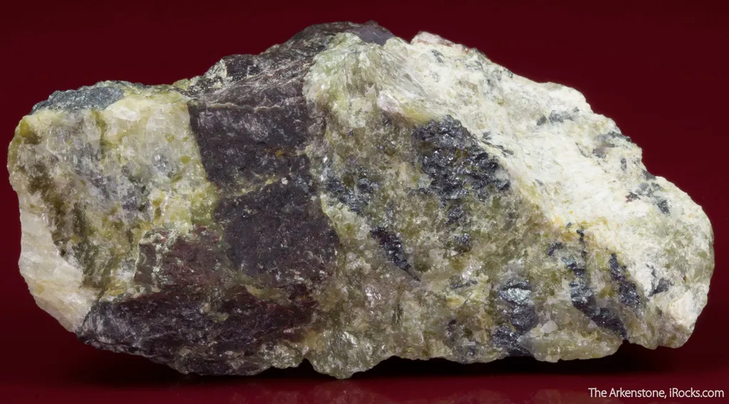 Althausite (type locality) with Hematite and Lizardite - image 3