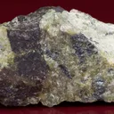 Althausite (type locality) with Hematite and Lizardite - image 3