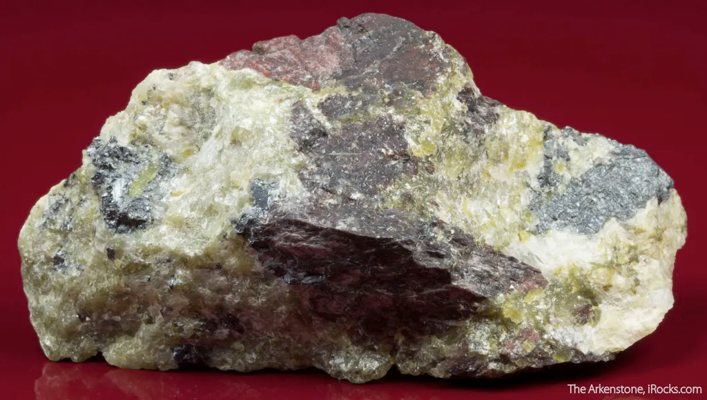 Althausite (type locality) with Hematite and Lizardite - image 2
