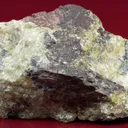Althausite (type locality) with Hematite and Lizardite - image 2