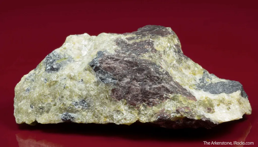 Althausite (type locality) with Hematite and Lizardite image
