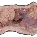 Amethyst in Rhodochrosite Geode - image 1