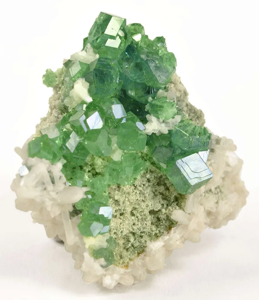 Andradite Var. Demantoid Garnet With Stilbite image