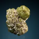 Andradite var. Demantoid (repaired) - image 1