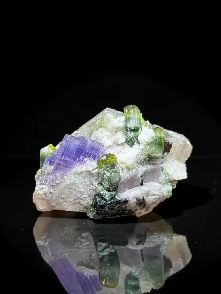 Apatite with Tourmaline, Tantalite and Muscovite image
