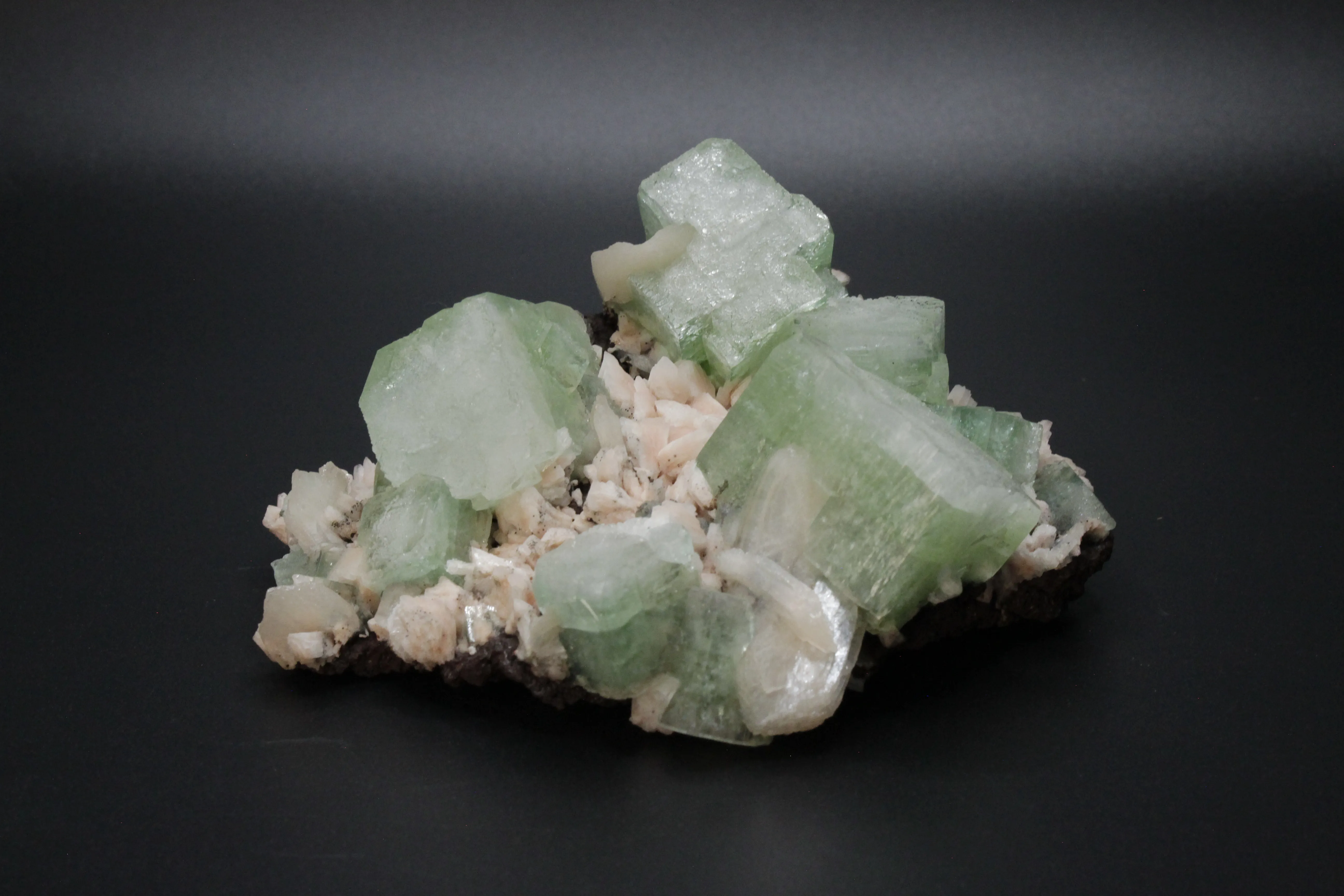 Apophyllite, light green crystals on Stilbite matrix - image 1