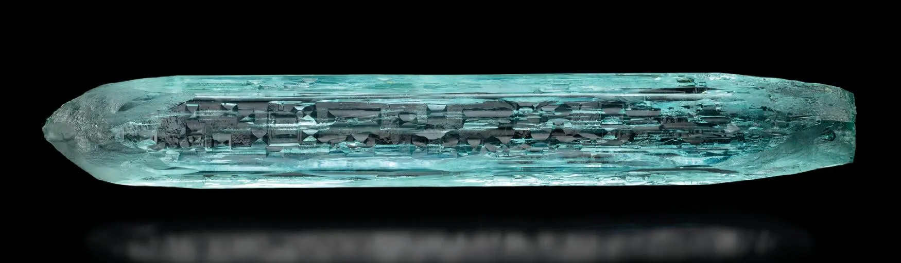22.5 cm aquamarine crystal from the Angico mine, Medina pegmatite field — credit: EarthWonders