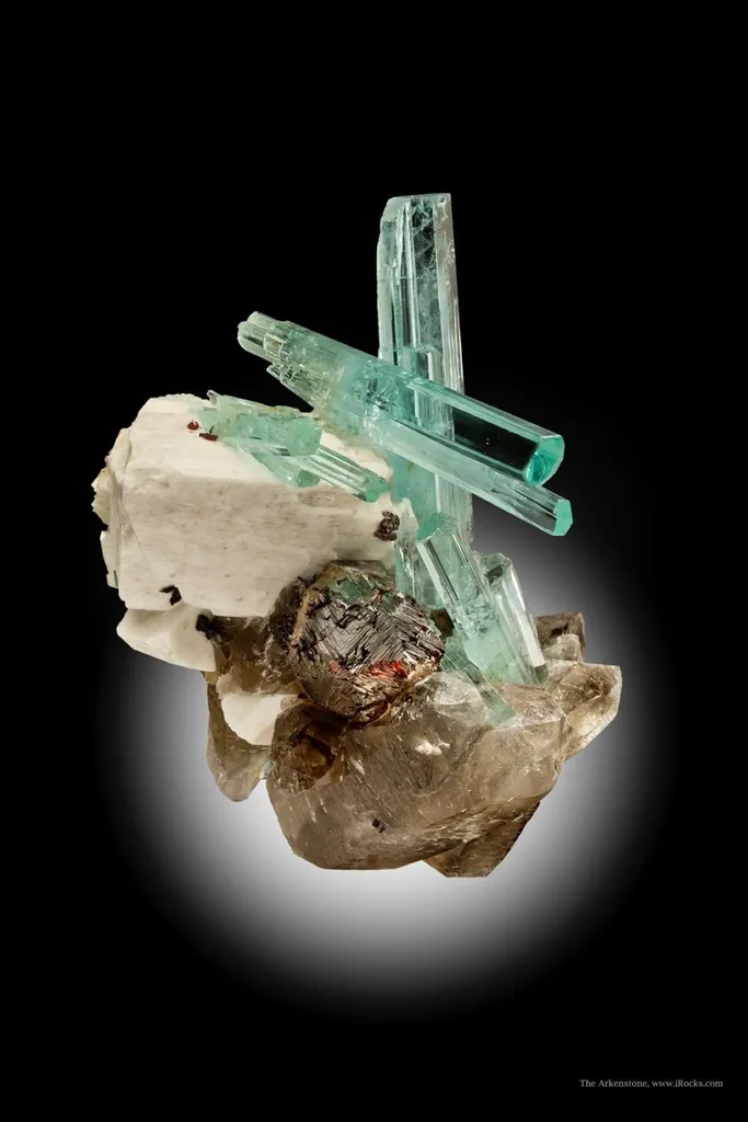 Aquamarine, Spessartine and Quartz on Feldspar image
