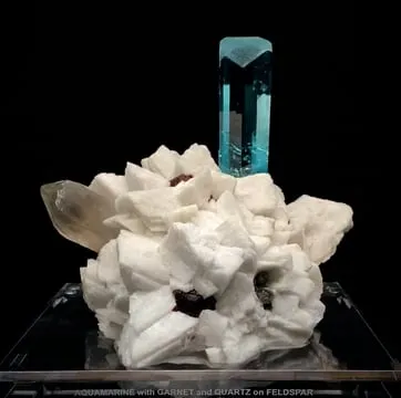 Aquamarine with Garnet and Quartz on Feldspar image