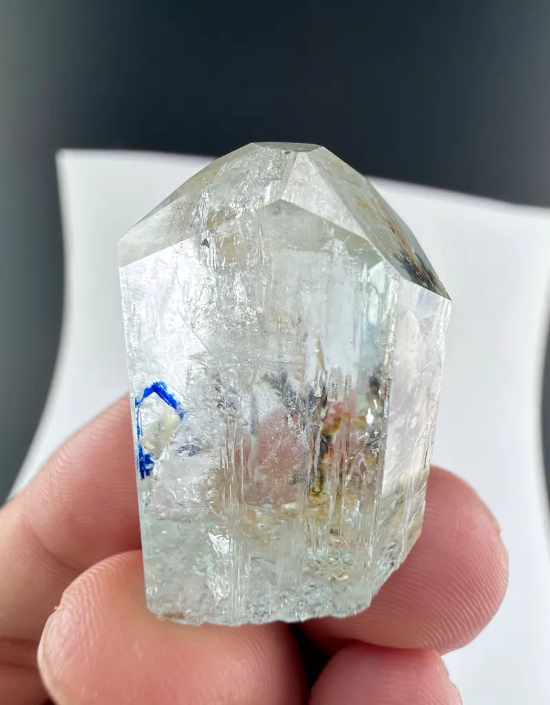 Aquamarine with hematite with moving water bubble from Pakistan image