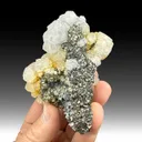 Arsenopyrite on Pyrite after Pyrrhotite with Calcite - image 1