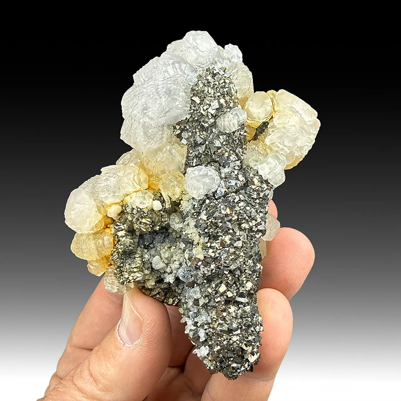 Arsenopyrite on Pyrite after Pyrrhotite with Calcite - image 1