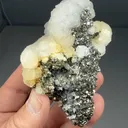 Arsenopyrite on Pyrite after Pyrrhotite with Calcite - image 2