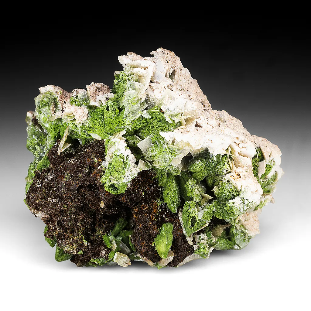 Austinite with Wulfenite, Calcite, Goethite, Quartz image