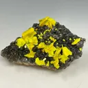 Autunite on Quartz on Granite - image 1