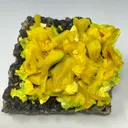 Autunite on Quartz on Granite - image 1