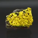Autunite on Quartz on Granite - image 1