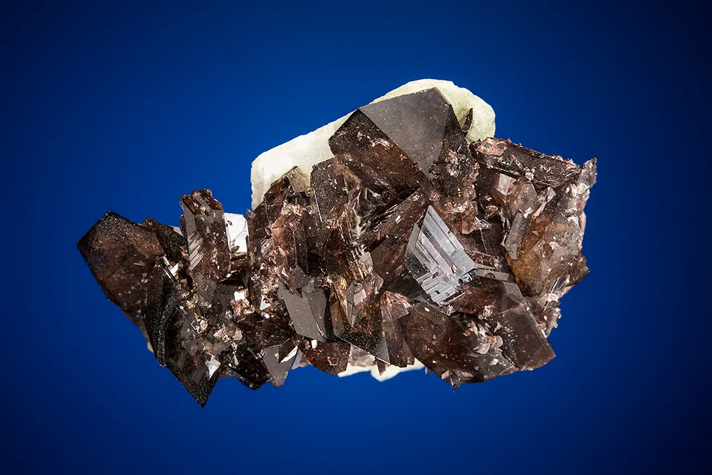 Axinite-(Fe) on Calcite image