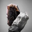 Axinite-(Fe) on Palygorskite - image 1