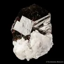 Axinite (Ferroaxinite) on Adularia - image 6