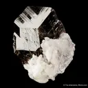Axinite (Ferroaxinite) on Adularia - image 1