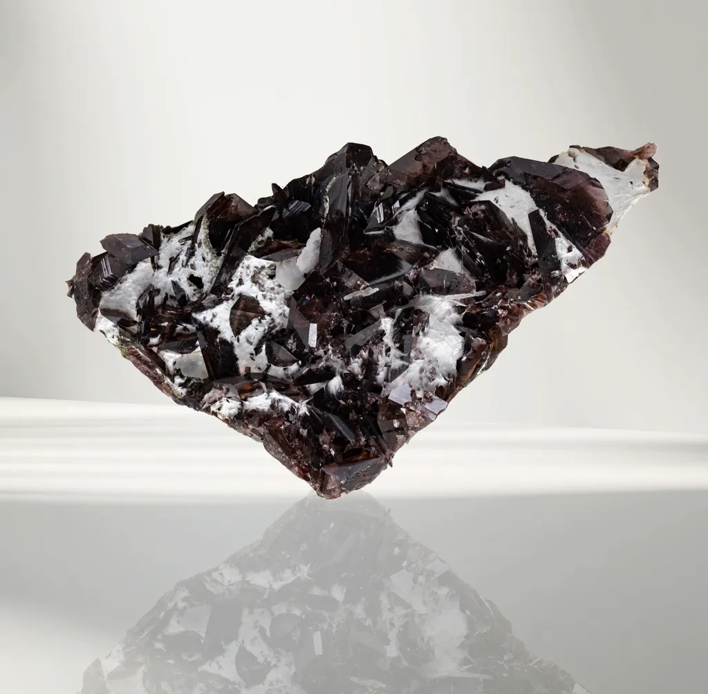 Axinite with Byssolite and tremolite from Russia, Khanty-Mansi Autonomous Okrug image