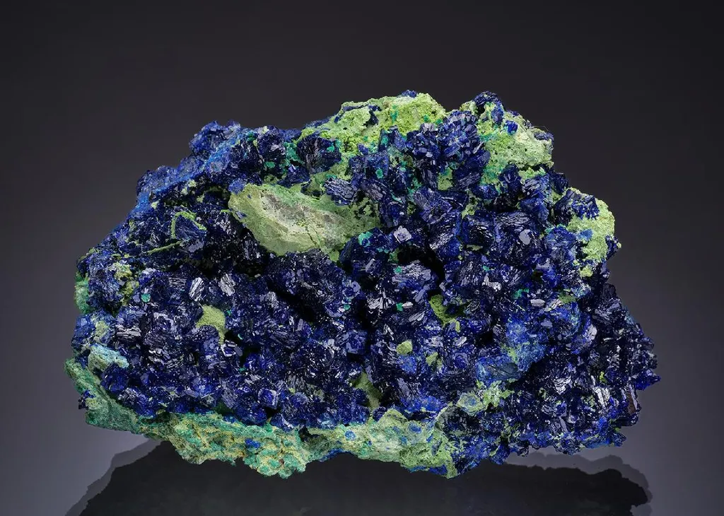 Azurite with Malachite on Bayldonite image
