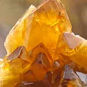Barite from Pöhla, Germany. Beautiful cluster of lustrous and translucent of top amber colored barite crystal with phantoms - image 3