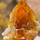 Barite from Pöhla, Germany. Beautiful cluster of lustrous and translucent of top amber colored barite crystal with phantoms - image 7