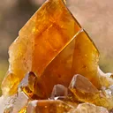 Barite from Pöhla, Germany. Beautiful cluster of lustrous and translucent of top amber colored barite crystal with phantoms - image 1