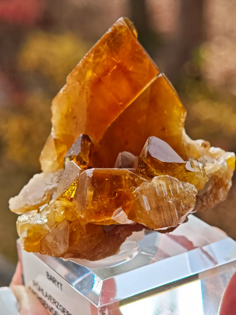 Barite from Pöhla, Germany. Beautiful cluster of lustrous and translucent of top amber colored barite crystal with phantoms - image 8