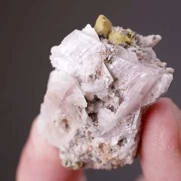 Behoite with NENADKEVICHITE and Synchysite-(Ce)