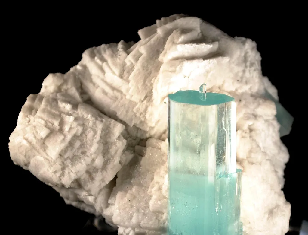 Beryl Var. Aquamarine on Feldspar image