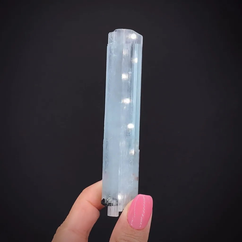 Beryl var. Aquamarine with Garnet inclusions image