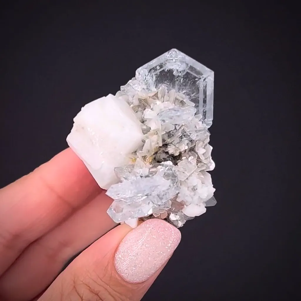 Beryl var. Aquamarine with Muscovite and Feldspar image