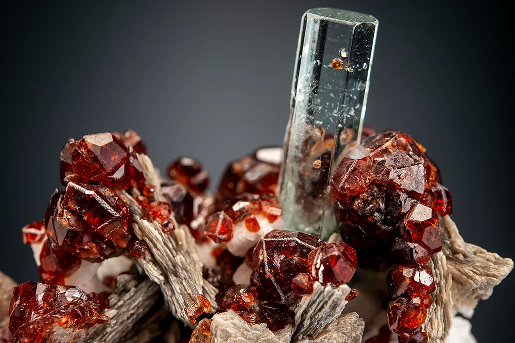 Beryl var. Aquamarine with Spessartine on Muscovite - image 2