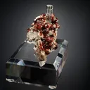 Beryl var. Aquamarine with Spessartine on Muscovite - image 5