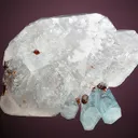 Beryl var. Aquamarine with Spessartine on Quartz - image 3