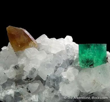 Beryl var. Emerald and Parisite-(Ce) on Calcite