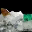 Beryl var. Emerald and Parisite-(Ce) on Calcite - image 1