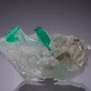 Beryl var. Emerald on Calcite - image 1