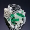 Beryl var. Emerald with Calcite - image 1
