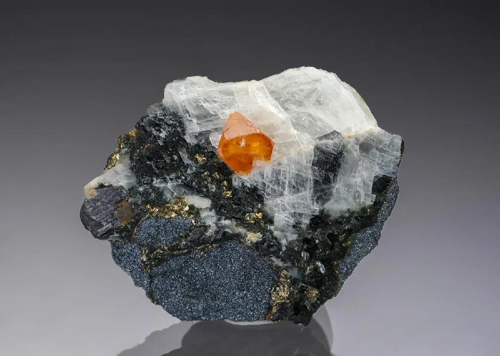 BERZELIITE with Calcite and Hausmannite image