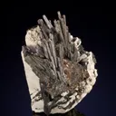 Birnessite ps. Serandite, Albite with Biotite - image 1