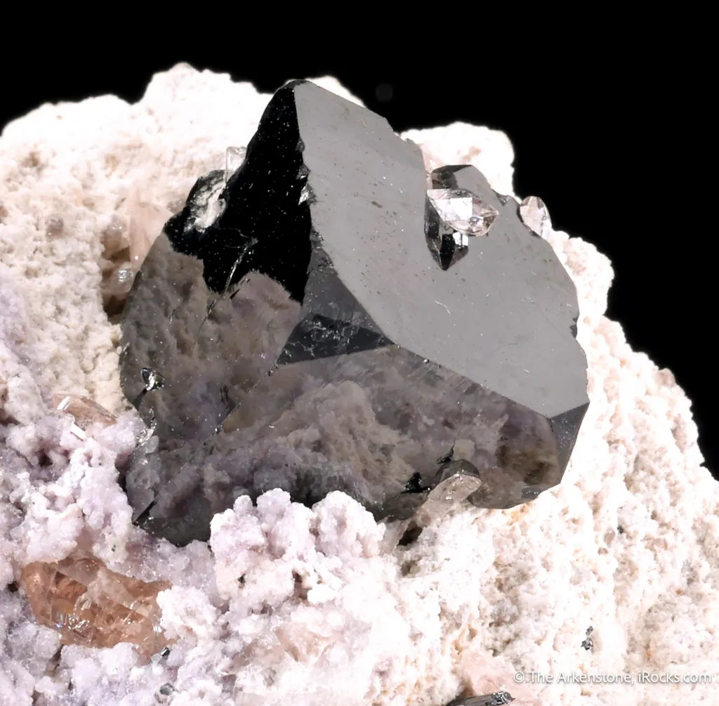 Bixbyite with Topaz image