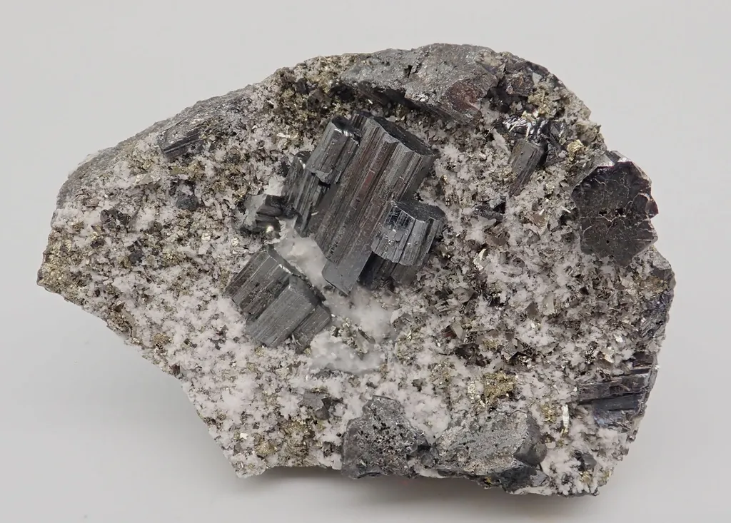 Bournonite with Calcite and Pyrite image