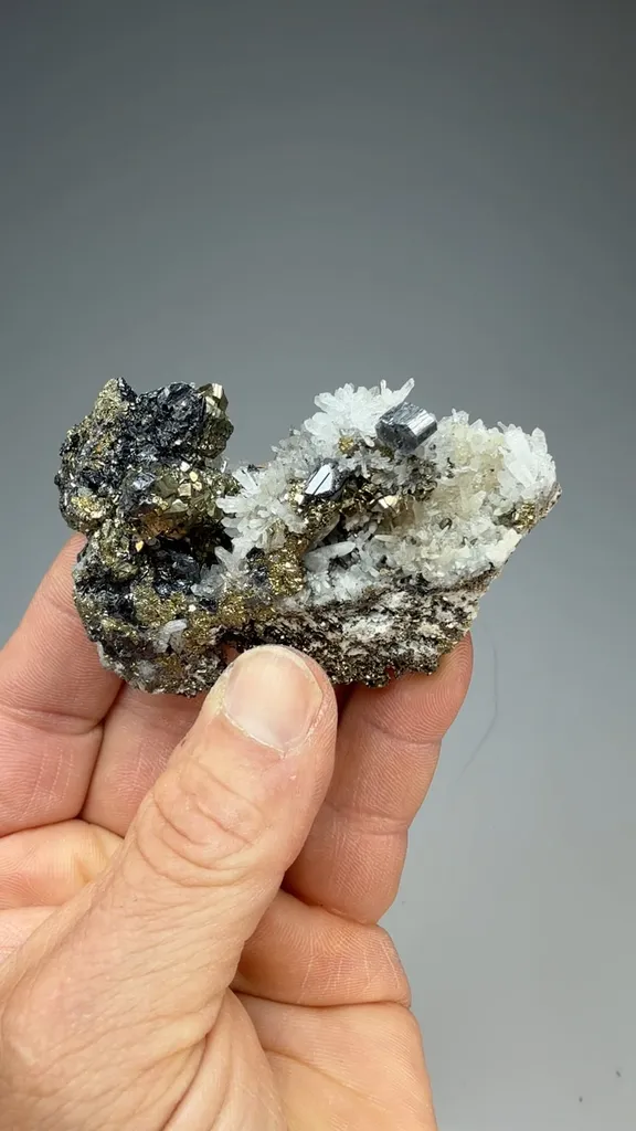 Bournonite with Quartz, Pyrite, Sphalerite image